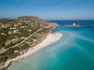 an aerial view of a beach in the ocean at Apartments Stintino - Insel Sardinien 23216 in Villa Sirena
