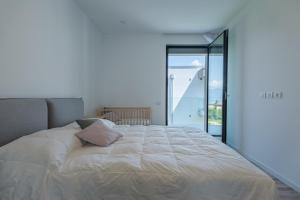 Postel nebo postele na pokoji v ubytování Arslan Family Apartment