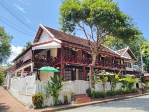 a house on the side of the street at Ban Lakkham River View in Luang Prabang