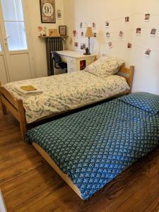 Postel nebo postele na pokoji v ubytování Chez Agathe et Mathieu