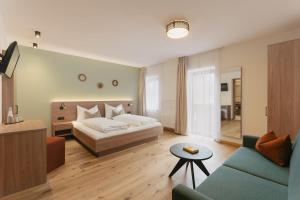 Postel nebo postele na pokoji v ubytování Hotel Gasthaus Post