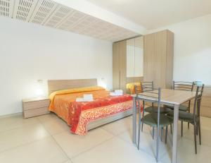 Llit o llits en una habitació de Hotel Croce Del Sud