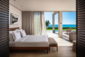 Postel nebo postele na pokoji v ubytování Vaya Beach Resort + 37 fotografií