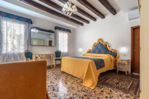 Postel nebo postele na pokoji v ubytování Hotel Casa Boccassini