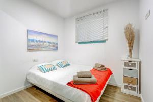 Postel nebo postele na pokoji v ubytování APARTAMENTOS LAGUNA AZUL
