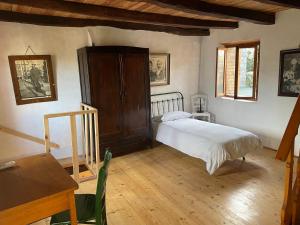 Postel nebo postele na pokoji v ubytování La casa della nonna + 9 fotografií