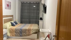 A bed or beds in a room at Can Joan