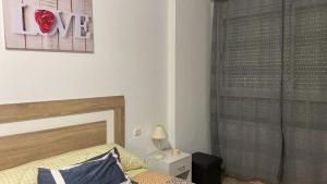 A bed or beds in a room at Can Joan