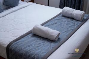 The Urban Hive Hotel客房内的一张或多张床位