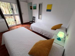 Posteľ alebo postele v izbe v ubytovaní Casa Ana Nerja