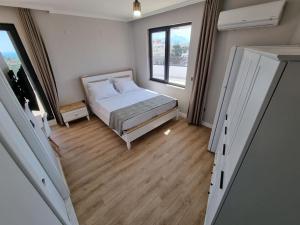 Postel nebo postele na pokoji v ubytování Royal Homes 503 + 15 fotografií
