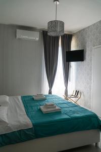 Katil atau katil-katil dalam bilik di Agriturismo il Casale