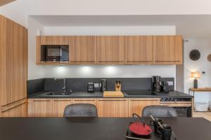 Kuchyňa alebo kuchynka v ubytovaní Perle de Savoie - Apt A401 - BO Immobilier - Châtel - Châtel Multipass Été 2025 en option au tarif de 3euros par jour et par personne