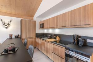 Kuchyňa alebo kuchynka v ubytovaní Perle de Savoie - Apt A401 - BO Immobilier - Châtel - Châtel Multipass Été 2025 en option au tarif de 3euros par jour et par personne
