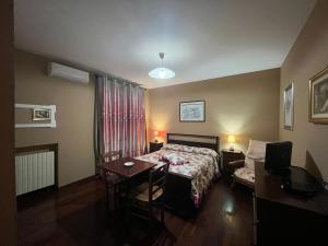 Postel nebo postele na pokoji v ubytování Agriturismo Montefosco