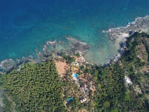 an aerial view of a island in the ocean at Adhvasaha Beach Spa Resort in Port Blair