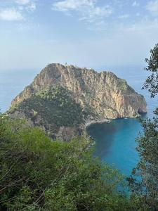 a small island in the middle of the ocean at Résidence Bejaia Legacy in Bejaïa