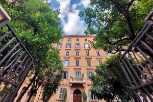 a large building with a balcony in front of it at Sanctuary Home 32 in Rome