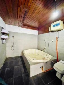 A bathroom at Lazuardy Syariah Park and Villa