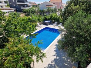 Bazén v ubytování Pool Apartments Knežević nebo v jeho okolí