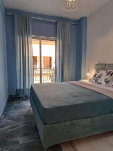 Ένα ή περισσότερα κρεβάτια σε δωμάτιο στο Gala Premium