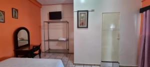 Tempat tidur dalam kamar di Hotel Los Andes Tegucigalpa