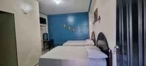 Postel nebo postele na pokoji v ubytování Hotel Los Andes Tegucigalpa + 6 fotografií