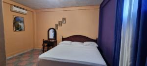 Postel nebo postele na pokoji v ubytování Hotel Los Andes Tegucigalpa