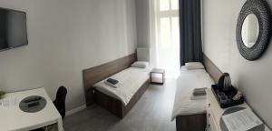 Televízia a/alebo spoločenská miestnosť v ubytovaní Noclegi Comfort - Self Check-in 24h