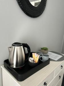 Príslušenstvo na prípravu kávy alebo čaju v ubytovaní Noclegi Comfort - Self Check-in 24h