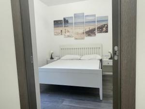 A bed or beds in a room at Villa Margherita