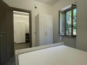 A bed or beds in a room at Villa Margherita