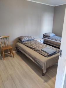 מיטה או מיטות בחדר ב-FeelHome apartment Vestregata 52 , 2nd floor