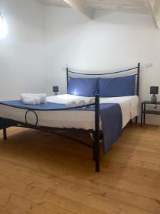 Postel nebo postele na pokoji v ubytování Casa del Vicolo