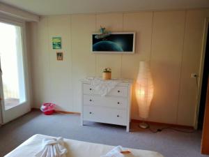 A bed or beds in a room at Apartment with great view at Residence Brunner