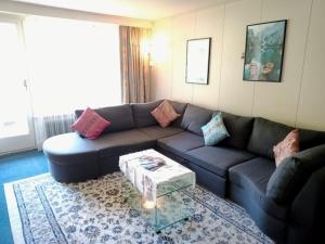 A seating area at Apartment with great view at Residence Brunner