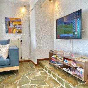 A television and/or entertainment centre at Villa Naya by the Beach