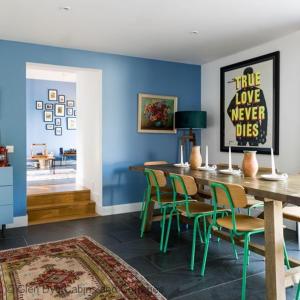 a dining room with a wooden table and chairs at Number 5 Steading Cottage in Banchory