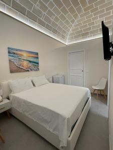 Posteľ alebo postele v izbe v ubytovaní La palma rooms & apartments