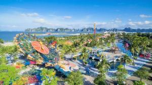 an aerial view of an amusement park with a roller coaster at Minh Đức Green Hotel Tuần Châu in Ha Long