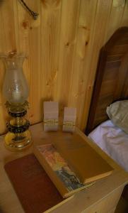 Postel nebo postele na pokoji v ubytování Hotel Okatsia სასტუმრო ოკაცია