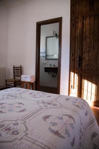 Postel nebo postele na pokoji v ubytování Cortijo Charcollana