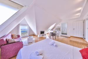 A bed or beds in a room at 3 House Apart Még 37 kép