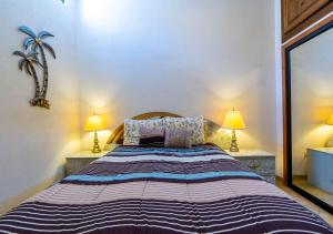 Ένα ή περισσότερα κρεβάτια σε δωμάτιο στο Astonishing Beach view Condo in Villa las Palmas San Felipe