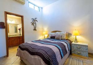 Ένα ή περισσότερα κρεβάτια σε δωμάτιο στο Astonishing Beach view Condo in Villa las Palmas San Felipe