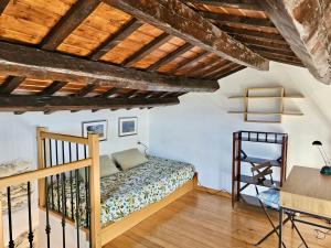 Ένα ή περισσότερα κρεβάτια σε δωμάτιο στο N266 - Numana, deliziosa casa in centro storico