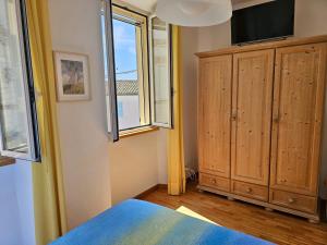 Μια τηλεόραση ή/και κέντρο ψυχαγωγίας στο N266 - Numana, deliziosa casa in centro storico