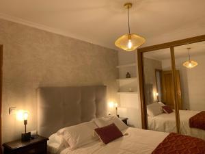 Ένα ή περισσότερα κρεβάτια σε δωμάτιο στο Apartamento Oriente