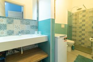 A bathroom at Appartamenti Craulo