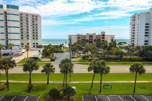 a view of a city with palm trees and buildings at Oceanwalk 1-501 in New Smyrna Beach